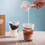 Macskanyomatos pohár