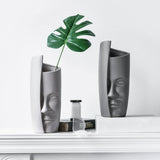 Művészi vázák arccal