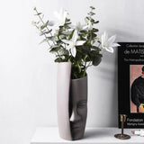 Művészi vázák arccal